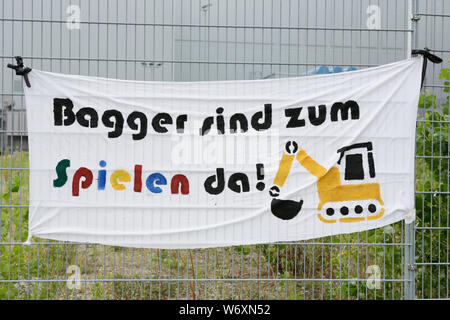 Mannheim, Germany. 03rd Aug, 2019. A banner reads 'Excavators are for playing'. Activists from the Ende Gelande organisation have occupied the coal conveyor belt on the large coal power plant in Mannheim. They also block the main entrance of the plant, calling for an end to the use of coal in energy production and the use of renewable energy sources. Credit: Michael Debets/Pacific Press/Alamy Live News Stock Photo