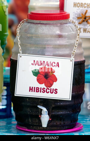 https://l450v.alamy.com/450v/w6xnx7/sweet-jamaica-hibiscus-fruit-punch-displayed-in-dispenser-tempts-the-potential-customer-seeking-to-quench-thirst-w6xnx7.jpg