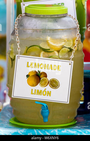 fruit punch in a drink dispenser at a party Stock Photo - Alamy