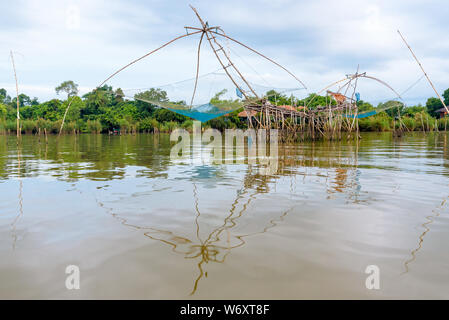 bamboo fishing netting native Yok Yor, is a fishing with local wisdom. Tool for capture aquatic animals  of native people made of bamboo and net are trap rural lifestyle at Pakpra  c Stock Photo