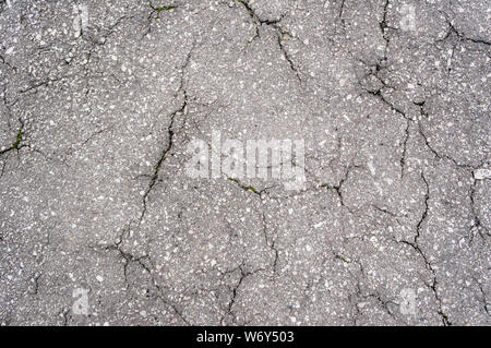 Asphalt in cracks. texture for background or design art work. Stock Photo