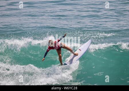 Keala Tomoda-Bannert of Hawaii competes in the Vans US Open of Surfing 2019 Stock Photo