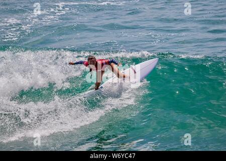 Keala Tomoda-Bannert of Hawaii competes in the Vans US Open of Surfing 2019 Stock Photo
