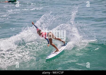 Keala Tomoda-Bannert of Hawaii competes in the Vans US Open of Surfing 2019 Stock Photo