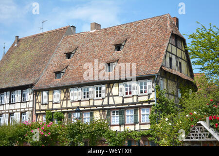 Beautiful traditional European style timber framing houses in city center of Wissembourg in France on a sunny day Stock Photo