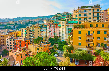 Picturesque residential buildings of Castelletto district in Genoa in the evening, Genova, Italy Stock Photo