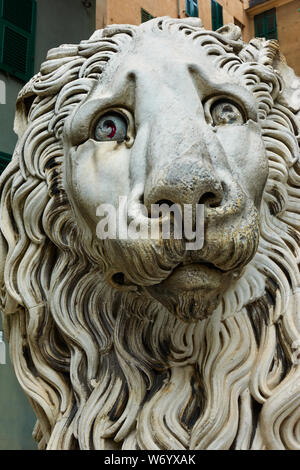 Marble lion's head  - Statue at the entrance of The San Lorenzo Cathedral in Genoa, Liguria, Italy Stock Photo
