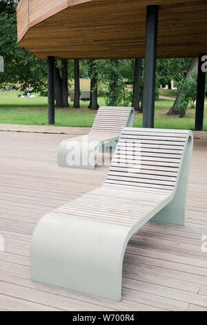 outdoor wooden furniture made of thermally modified timber is safe for health in the city Park. Stock Photo