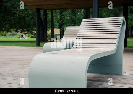 outdoor wooden furniture made of thermally modified timber is safe for health in the city Park. Stock Photo