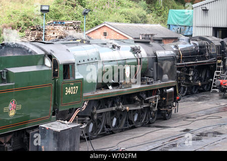 West Country class preserved steam locomotive 34027 Taw Valley in Bridgnorth shed on the Severn Valley railway for coal and water on 1st August 2019. Stock Photo