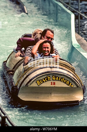 The Stanley Falls log flume water ride has long been a family favorite at Busch Gardens, a popular animal and adventure park in Tampa, Florida, USA. This is old-time classic ride is a leisurely alternative to the death-defying coaster rides for which the park is now known. First launched in 1973, the four-person boats follow the flume's twists and turns through a lush jungle before diving toward a final 40-foot (12-meter) splashdown that often dampens passengers but not their spirits. Stock Photo