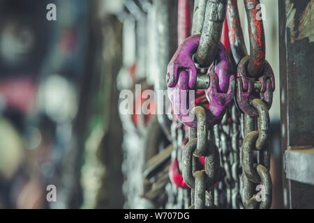 Industrial Grade Support Chains on a Rack. Heavy Duty Equipment. Stock Photo