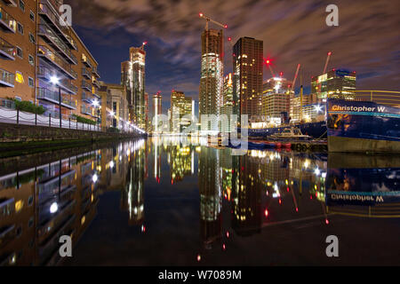 Dockland reflections in summer night, England, UK Stock Photo