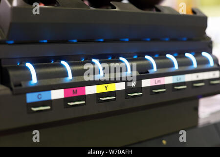 Ink supply unit of large format flatbed inkjet printer. Selective focus. Stock Photo