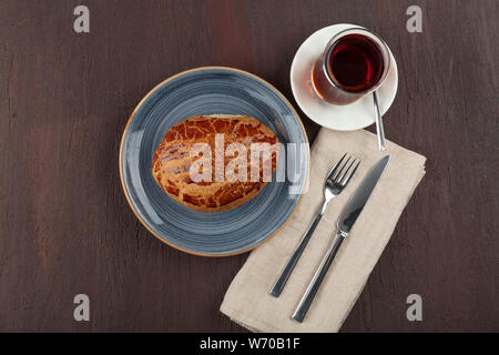 Turkish pastry product , tasty cheese pogaca. Turkish Pastries; pogaca, borek, acma, served on wooden table. Stock Photo