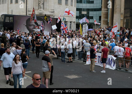 Supporters hold placards and flags during a pro-Israel rally in Sydney ...