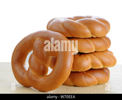 fresh pretzel bread against white background Stock Photo