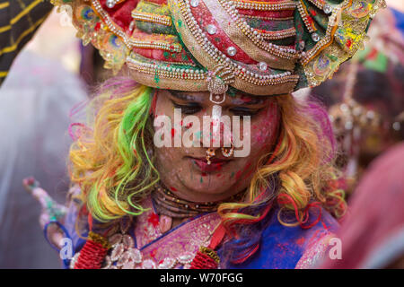 Portrait of a man dressed as Lord Krishna  during Holi Celebrations at Mathura,Uttarpradesh,India,Asia Stock Photo