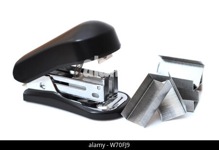 a lot of staple and stapler on white background Stock Photo