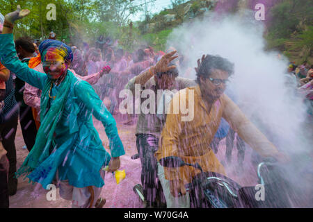 Colour splash in the streets of Barsana during Holi Celebrations at Mathura,Uttarpradesh,India,Asia Stock Photo