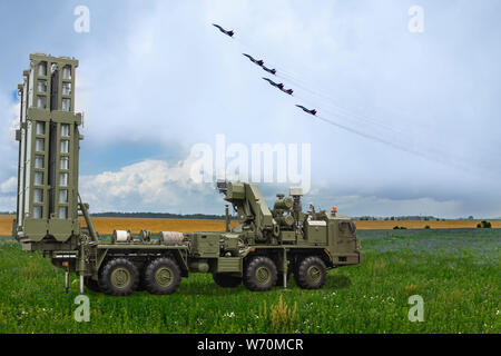 The S-300 missile system against the background of Russian military aircraft Stock Photo