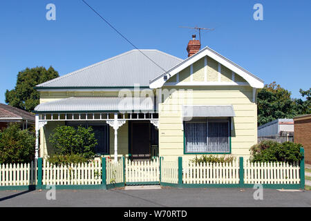 Williamstown, Australia: March, 2019: Traditionally built bungalow in the 20th century Australian style with a porch, verandah and picket fence. Stock Photo