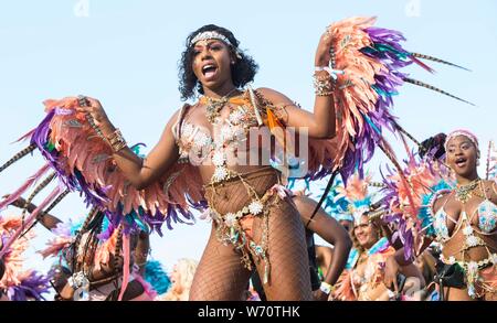 (190804) -- TORONTO, Aug. 4, 2019 (Xinhua) -- Dressed up revellers take part in the 2019 Toronto Caribbean Carnival Grand Parade in Toronto, Canada, Aug. 3, 2019. People from near and far converged on the street for the annual Caribbean Carnival Grand Parade here on Saturday. (Xinhua/Zou Zheng) Stock Photo