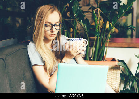 Young student employee at workplace Stock Photo - Alamy