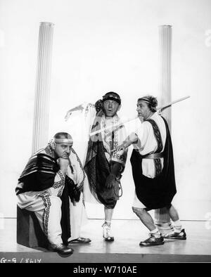 MOE HOWARD LARRY FINE and JOE De RITA as CURLY JOE in THE THREE STOOGES MEET HERCULES 1962 director Edward Bernds Normandy Productions / Columbia Pictures Stock Photo