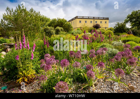 UK, Wales, Carmarthenshire, Llanarthney, National Botanic Garden of Wales, Principlity House, Regency property and floral planting Stock Photo