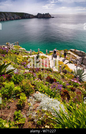 UK, England, Cornwall, Porthcurno, Minack Theatre, terraced garden, view across bay to Logan Rock Stock Photo
