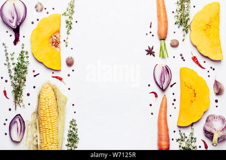 Creative layout made with Autumn seasonal vegetables, herbs and spices. Healthy Vegetable Food Frame. Stock Photo