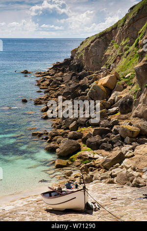 UK, England, Cornwall, Porthgwarra, rowing boat on slipway in small rocky creek Stock Photo