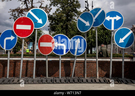Road signs installed on a street in a center of  a city Stock Photo