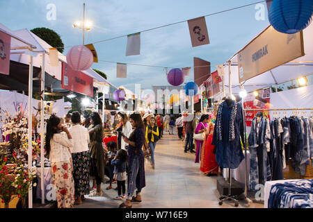 Indian people and foreigner travelers walking travel visit and shopping product at thai festival street night market in evening on March 17, 2019 in N Stock Photo