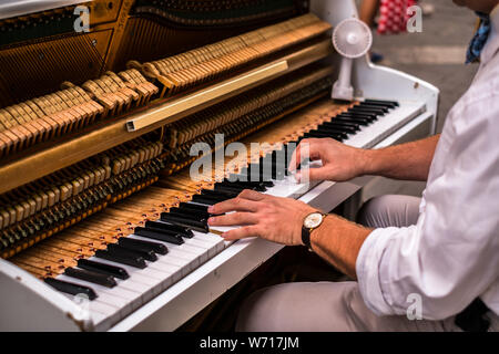 Valletta Malta, July 16 2019. Hands man playing the piano on Replubic street in Valletta,Malta Stock Photo