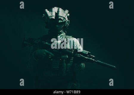 Army special forces fighter low key studio shoot Stock Photo