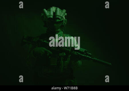Army special forces fighter low key studio shoot Stock Photo