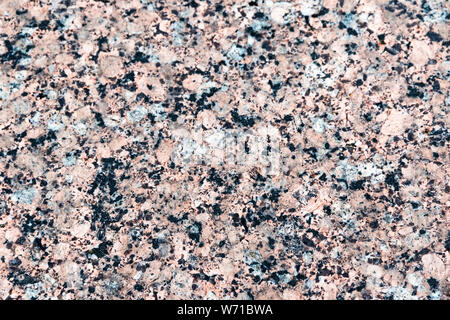Red marble terrazzo flooring pattern. Texture of mosaic floor with natural stones, granite, marble, quartz, limestone, concrete. Polished rock surface Stock Photo