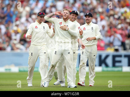 England's Ben Stokes celebrates taking the wicket of Australia's Travis Head during day four of the Ashes Test match at Edgbaston, Birmingham. Stock Photo