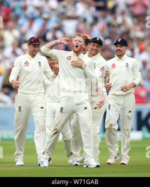 England's Ben Stokes celebrates taking the wicket of Australia's Travis Head during day four of the Ashes Test match at Edgbaston, Birmingham. Stock Photo