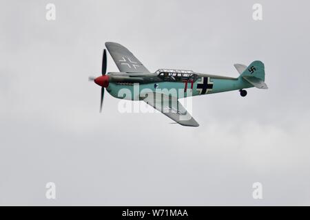 Hispano HA-1112-M4L Buchon “Red 11” (G-AWHC) airborne at the 2019 Flying Legends Airshow Stock Photo