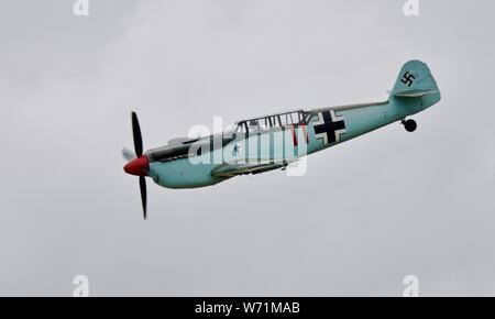 Hispano HA-1112-M4L Buchon “Red 11” (G-AWHC) airborne at the 2019 Flying Legends Airshow Stock Photo