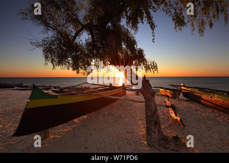 Traditional fishing pirogue on the beach at sunset in Anakao, Madagascar Stock Photo