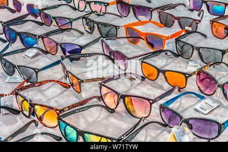 Different sunglasses on market Stock Photo