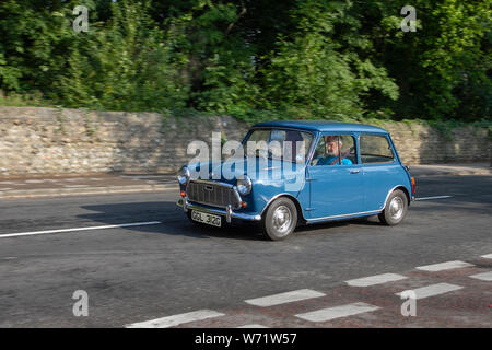 1969 60s blue Morris Mini 1000 en-route to Lytham Hall classic vintage collectible transport festival vehicles show. The Festival of Transport will see a diverse range of classic, vintage and prestige vehicles on display. Stock Photo