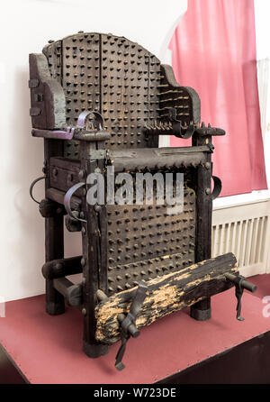 Torture chair with thorns, museum in Prague Stock Photo