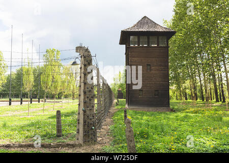 Watchtower and fence on territory of Auschwitz II Stock Photo