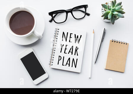 New year plan text on notepad with office accessories.Business motivation,inspiration concepts idea Stock Photo