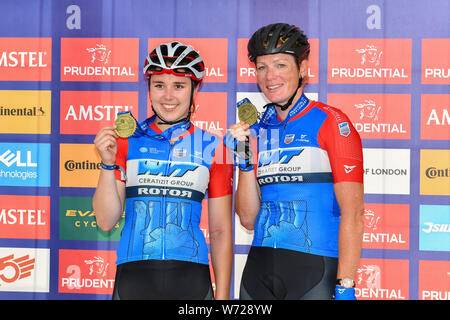 London, UK. 04th Aug, 2019. English track, road and Team WNT cyclist Hannah Walker (left) and her team mate Kristen Wild (right) pose photos for media after completed their 48 miles challenge during Prudential RideLondon at The Mall on Sunday, August 04, 2019 in LONDON United Kingdom. Credit: Taka G Wu/Alamy Live News Stock Photo